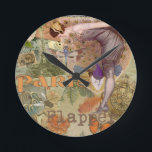 Paris Flapper Art Deco Peacock Vintage Round Clock<br><div class="desc">Vintage Peacock Flapper - This paris flapper collage includes lots of fun vintage images, beautifully arranged for home decor that requires a colorful vintage gift. The image includes a flapper woman looking down at a butterfly, a peacock, and a dragonfly. In the background is the Eiffel tower and other paris...</div>