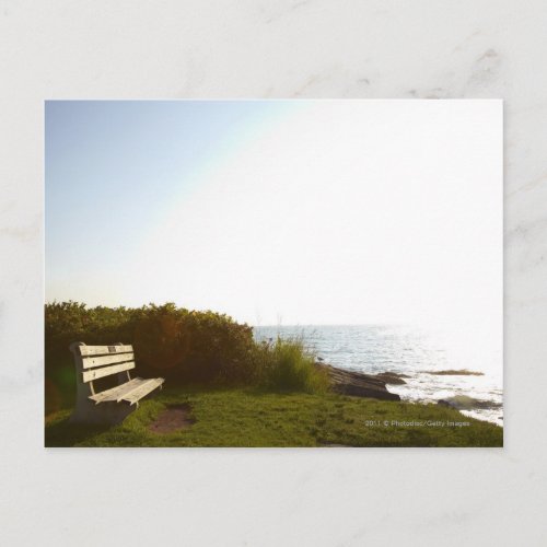 Park bench overlooking Atlantic Ocean Postcard