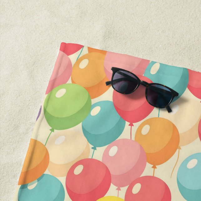 Party balloons in different colors beach towel (In Situ)
