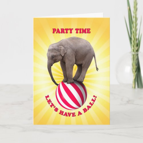 Party Invitation with a happy elephant on a ball