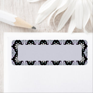Pastel floral shapes on a black background label