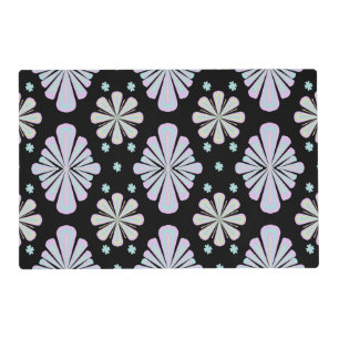 Pastel floral shapes on a black background placemat