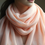 Pastel peach - solid color  scarf<br><div class="desc">Wrap yourself in softness and elegance with this flowing Pastel Peach chiffon scarf. Measuring 16 inches wide by 72 inches long, this oblong rectangle scarf offers endless styling possibilities—whether draped over your shoulders, tied around your neck, or worn as a headscarf. Crafted from lightweight chiffon, this scarf is both airy...</div>