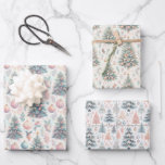 Pastel Pink and Blue Christmas Trees Decorated Wrapping Paper Sheets<br><div class="desc">Cute wrapping paper in three different patterns of pink,  white and blue Christmas trees with presents and decorations</div>