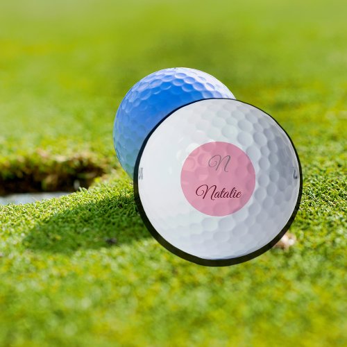 Pastel pink solid color monogrammed golf balls