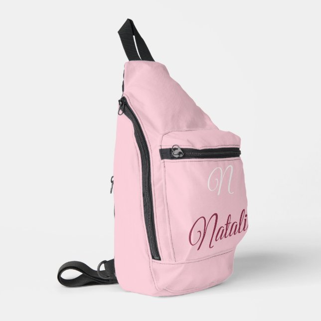 Pastel pink solid color monogrammed sling bag (Left Corner)