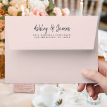 Pastel Pink Wedding Return Address Envelope<br><div class="desc">Chic, modern and simple wedding return address envelope with your names in off-black elegant handwritten script calligraphy on a pastel pink background. Simply add your names and address. Exclusively designed for you by Happy Dolphin Studio. This beautiful wedding envelope is part of the 'dusty rose floral' wedding collection in our...</div>