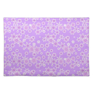 Pastel snowflakes against lavender placemat