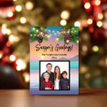 Pastel Sunset Beach Ocean Theme Photo Christmas Holiday Card<br><div class="desc">Festive Luau Photo Christmas Holiday greeting Card features evergreen pine tree, pinecones, strings of lights and beautiful bright pastel colors of the sunset on the beach. Turquoise blue, purple, and orange sunset ombre colors create an astounding blend of tropical shades for a beach, ocean holiday theme for a florida, california,...</div>