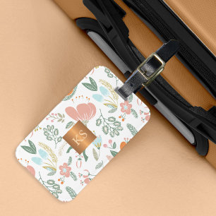 Pastel wildflowers with metallic copper monogram luggage tag
