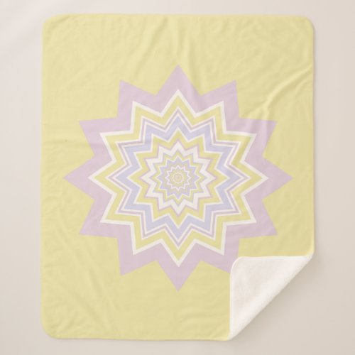 Pastel yellow geometric patterned sherpa blanket