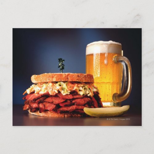 Pastrami sandwich with mug of beer postcard