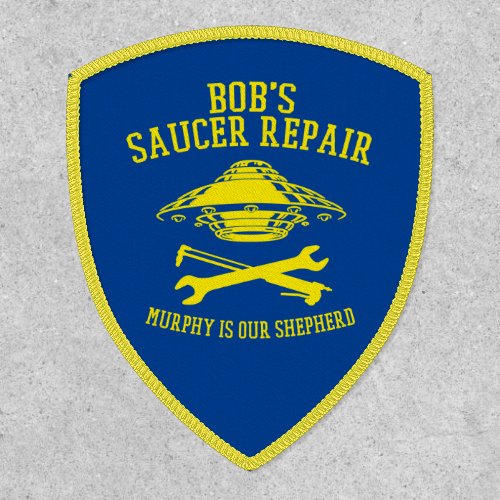 patch with Bobs Saucer Repair logo