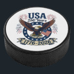 Patriotic American Eagle 250 Years 1776-2026 Hockey Puck<br><div class="desc">Celebrate America's 250th Anniversary with this colorful design featuring a majestic eagle with wings spread in flight carrying the American flag along with the words "USA 250 Years 1776-2026". It's a great way to show your patriotism all throughout the 2026 celebrations and beyond.</div>
