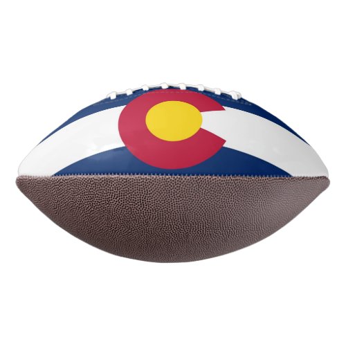 Patriotic american football with Colorado flag