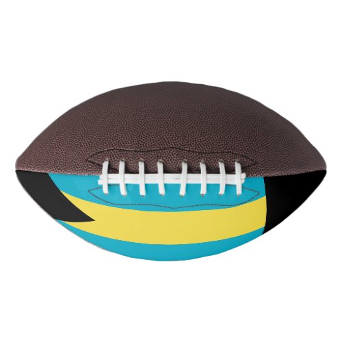 Patriotic american football with flag of Bahamas