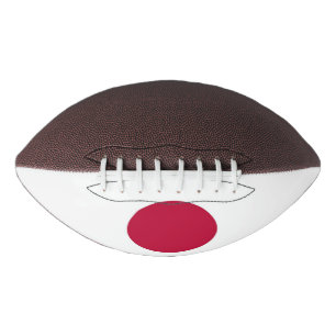 Patriotic american football with flag of Japan