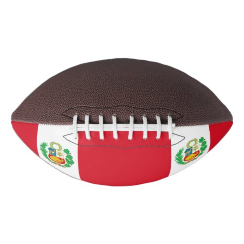 Patriotic american football with flag of Peru