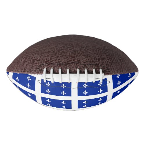 Patriotic american football with flag of Quebec