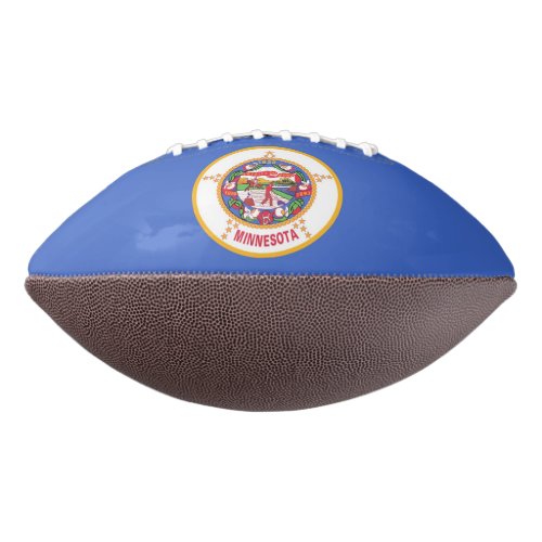 Patriotic american football with Minnesota flag