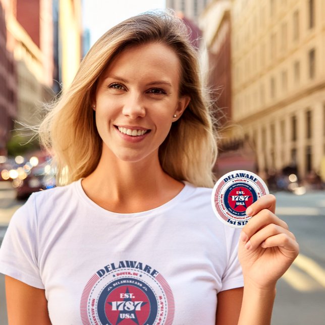 Patriotic Delaware Circle with State Details Button (A young woman holding the Delaware Circle button designed by The American Family.)