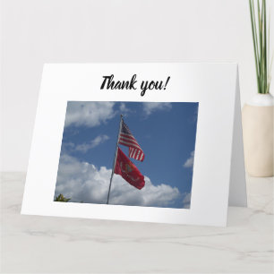 Patriotic flags and a blue sky on a letterpress thank you card