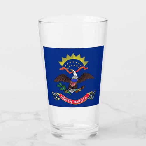 Patriotic glass cup with flag of North Dakota