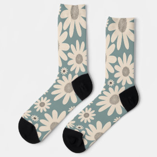 Pattern of chamomile flowers on a soft green socks