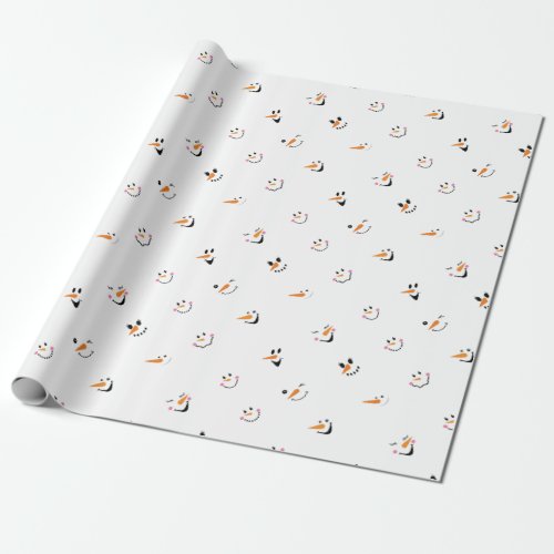 Pattern Of Funny Snowmen Faces On White Wrapping Paper