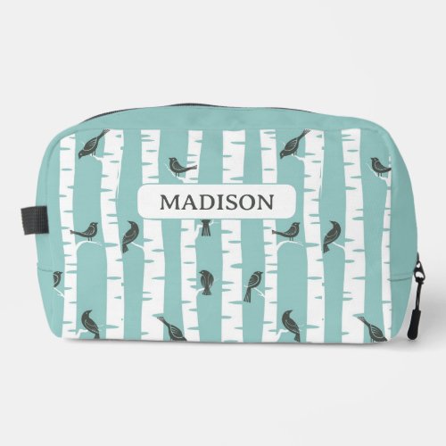 Pattern with birds and trees dopp kit