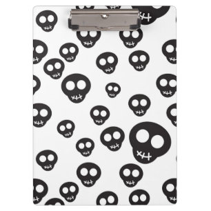Pattern with black skulls on white clipboard