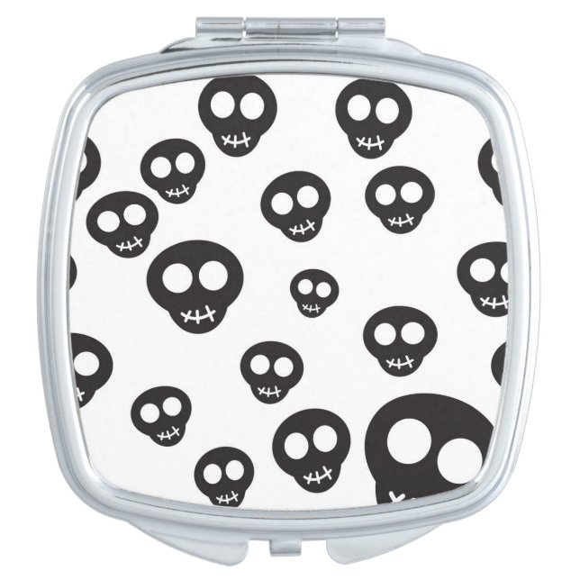 Pattern with black skulls on white makeup mirror (Front)