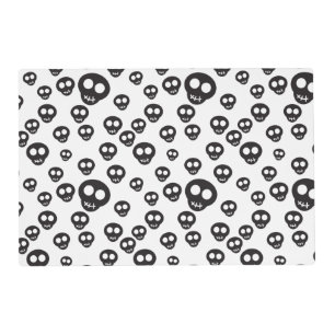Pattern with black skulls on white placemat