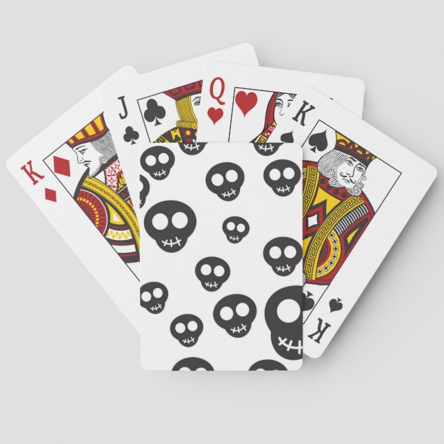 Pattern with black skulls on white poker cards (Back)