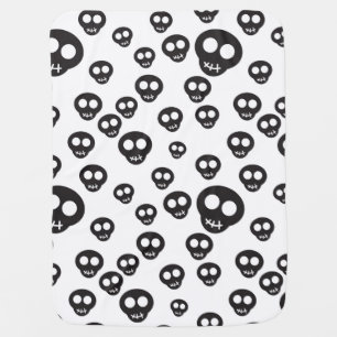 Pattern with black skulls on white receiving blanket