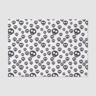 Pattern with black skulls on white tissue paper