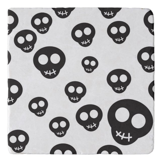 Pattern with black skulls on white trivet (Front)
