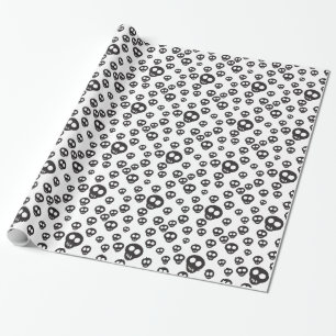 Pattern with black skulls on white wrapping paper