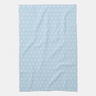 Pattern with white anchors on blue kitchen towel