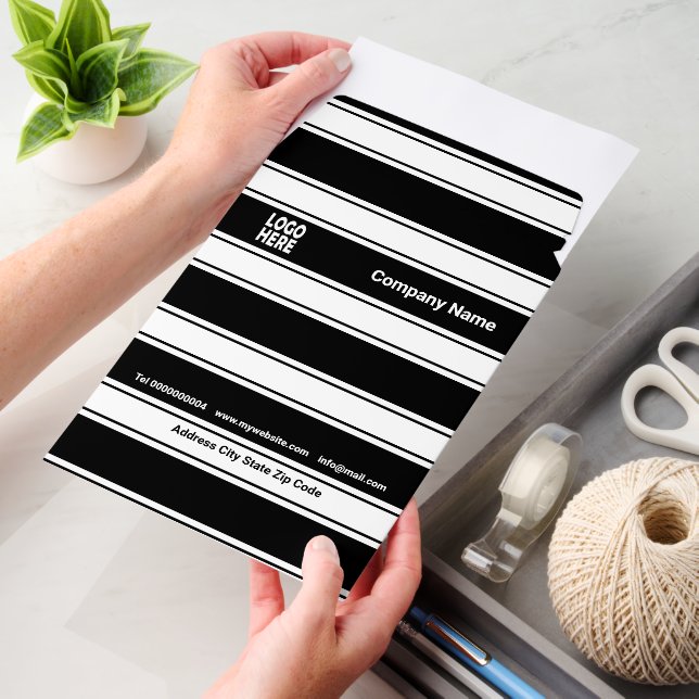 Patttern of black and white stripes and logo envelope mailers (Desk)