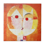 Paul Klee Senecio Tile<br><div class="desc">Paul Klee Senecio tile. Oil painting on canvas from 1922. One of Paul Klee’s most famous paintings, Senecio features an abstract face with offset red eyes on a fiery orange background. One of the most recognized cubist paintings from Klee’s Bauhaus period, Senecio makes a great gift for fans of Paul...</div>