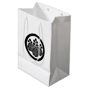 Paulownia with 5-3 blooms in circle medium gift bag