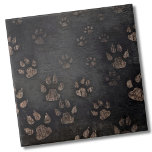 Paw Ceramic Tile<br><div class="desc">The captivating paw print pattern in this design appears as if the wood has been meticulously etched around each paw, resulting in a distinctive blend of bold black outlines against a neutral backdrop. This striking interplay of mixed paw prints adds a touch of rustic charm to the overall aesthetic. Whether...</div>