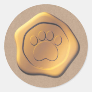 paw print gold wax seal on brown paper