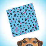 Paw prints and hearts pattern Blue Monogram name Bandana<br><div class="desc">Cute bandana with black paw prints and pink hearts pattern on blue color. Lovely accessory for dogs and dog owners :) • Personalize it with pet's name and monogram, delete text or customize further - edit fonts, colors, resize/move/delete elements, add text and more, or transfer it on another product. •...</div>