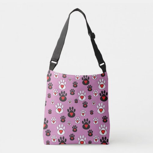 Paw prints with red hearts on pink  crossbody bag