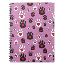 Paw prints with red hearts on pink