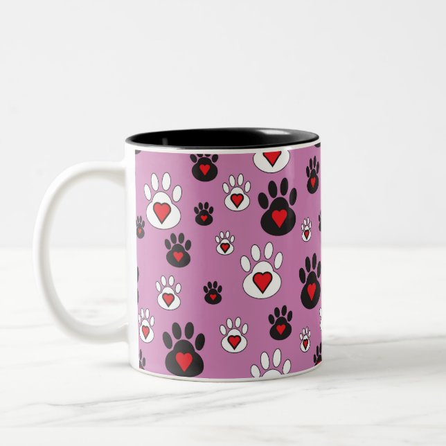 Paw prints with red hearts on pink  Two-Tone coffee mug (Left)
