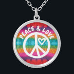 Peace and Love Tie Dye Stripes Silver Plated Necklace<br><div class="desc">Show some peace and love with this white peace sign and heart shape with the text "Peace & Love".  Background is colorful tie dye style stripes in a rainbow of colors including red,  pink,  green,  blue,  purple,  orange and yellow.</div>