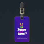 Peace and Love Typography Rainbow Hand Peace Sign Luggage Tag<br><div class="desc">A funky cool personalized luggage tag with peace and love written in a groovy typography font. The illustration is a hand-shaped peace symbol,  fingers raised in the classic v sign all made in rainbow colors. A little doodle heart beside the word love. Psychedelic groovy design. Acid purple background.</div>